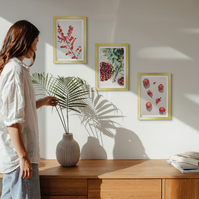Framed triptych Red fruits and plants in a minimalist style