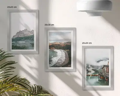 3-piece wall art set with mountain landscapes, a beach, and a wooden house