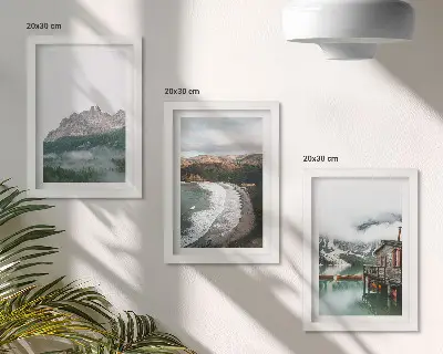 3-piece wall art set with mountain landscapes, a beach, and a wooden house