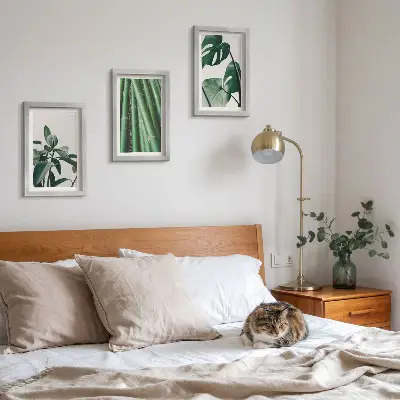 3-piece wall art set featuring bamboo stems and monstera leaves