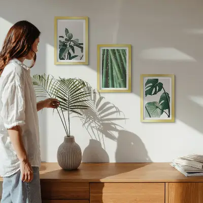 3-piece wall art set featuring bamboo stems and monstera leaves