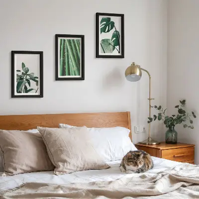 3-piece wall art set featuring bamboo stems and monstera leaves