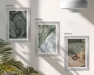 Photo frame wall with tropical plants and summer holiday accents