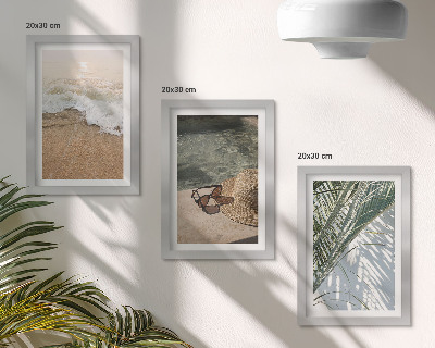 Photo frame wall Water beach hat and sunglasses leaves