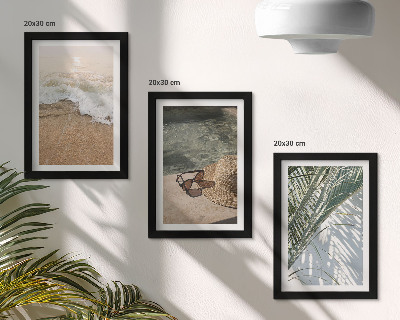 Photo frame wall Water beach hat and sunglasses leaves
