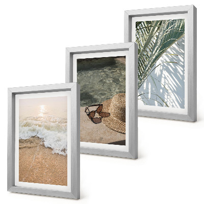 Photo frame wall Water beach hat and sunglasses leaves