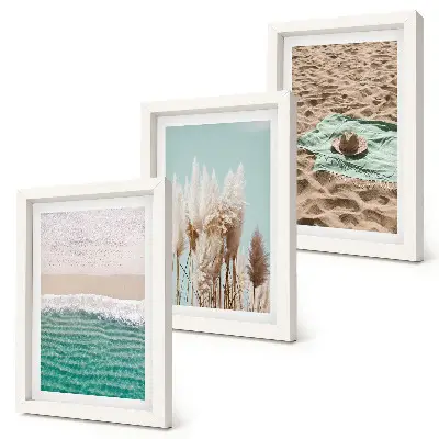 3-piece wall art set featuring a relaxing beach scene with waves grass a hat and sand