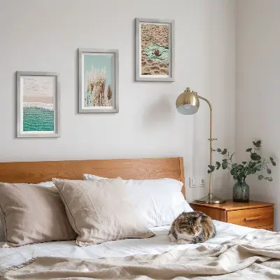 3-piece wall art set featuring a relaxing beach scene with waves grass a hat and sand