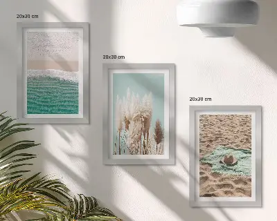 3-piece wall art set featuring a relaxing beach scene with waves grass a hat and sand