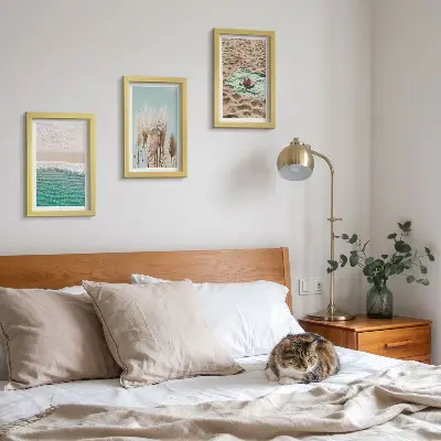 3-piece wall art set featuring a relaxing beach scene with waves grass a hat and sand