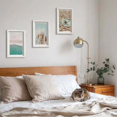 3-piece wall art set featuring a relaxing beach scene with waves grass a hat and sand
