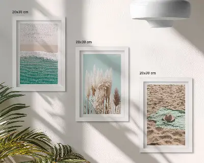 3-piece wall art set featuring a relaxing beach scene with waves grass a hat and sand