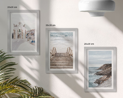 Photo frame wall Views of the sea and architecture of Santorini against the sky