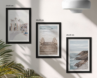 Photo frame wall Views of the sea and architecture of Santorini against the sky