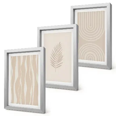 Framed triptych with botanical patterns in shades of beige