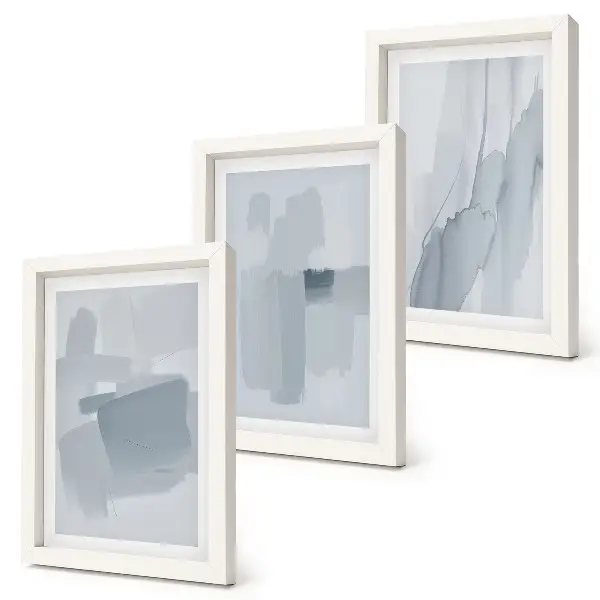 Photo frame wall with abstract watercolor style compositions