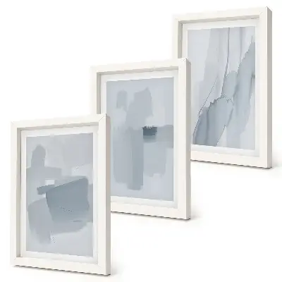 Photo frame wall with abstract watercolor style compositions