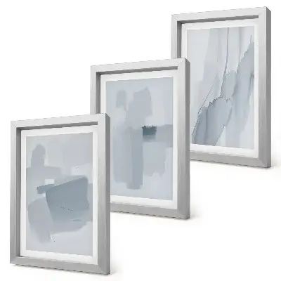 Photo frame wall with abstract watercolor style compositions