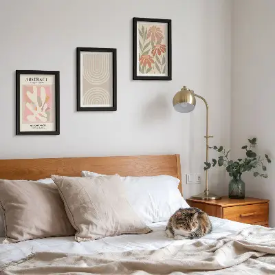 Photo frame wall with abstract shapes and plant motifs in pastel colors