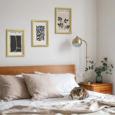 Photo frame wall with abstract plant patterns and geometric shapes