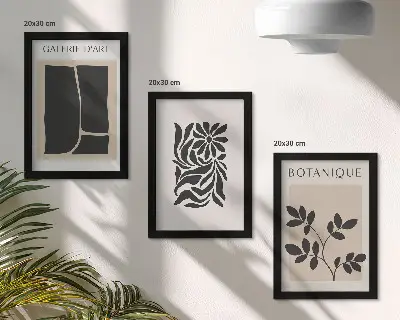 Photo frame wall with abstract plant patterns and geometric shapes