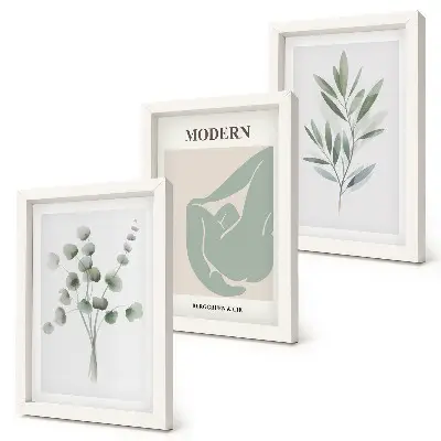 Photo frame wall gallery with delicate green plant motifs