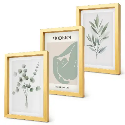 Photo frame wall gallery with delicate green plant motifs