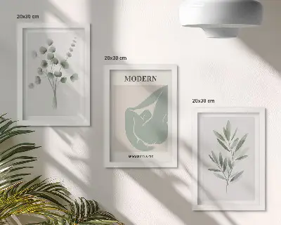 Photo frame wall gallery with delicate green plant motifs