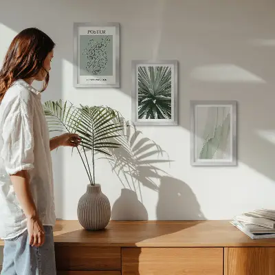 Photo frame wall with plant patterns in shades of green and beige