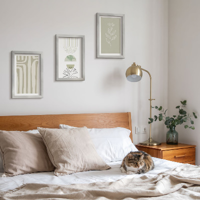 Photo frame wall Geometric patterns with plant accents in shades of green