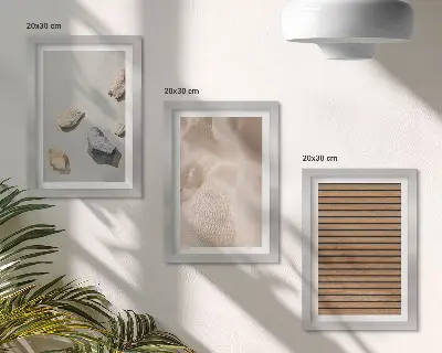 Framed triptych stones, wood, and fabric with various textures