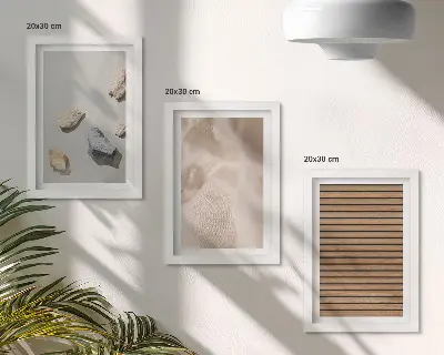 Framed triptych stones, wood, and fabric with various textures