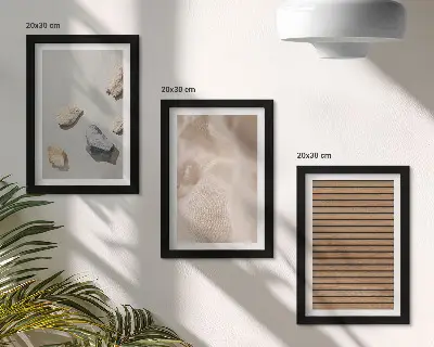 Framed triptych stones, wood, and fabric with various textures