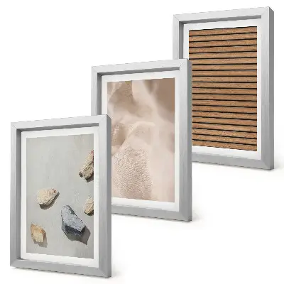Framed triptych stones, wood, and fabric with various textures