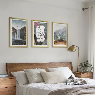 Wall art set featuring a nature scene with a waterfall mountains and a boat