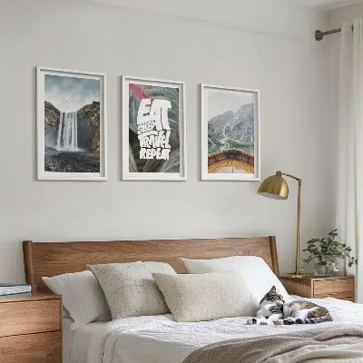 Wall art set featuring a nature scene with a waterfall mountains and a boat