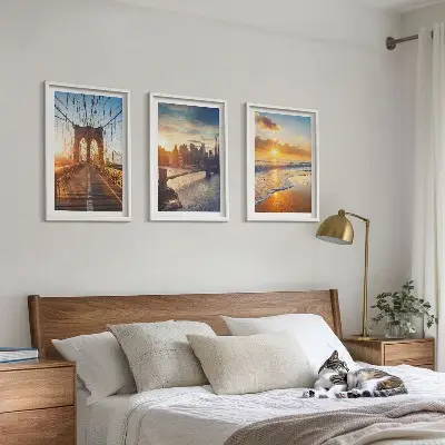 Wall art set featuring bridges and city sunsets