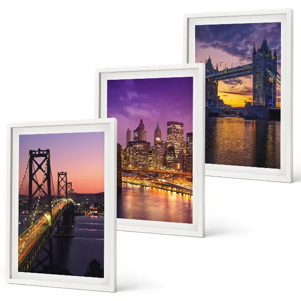 Wall art set featuring bridges, sun, and city views
