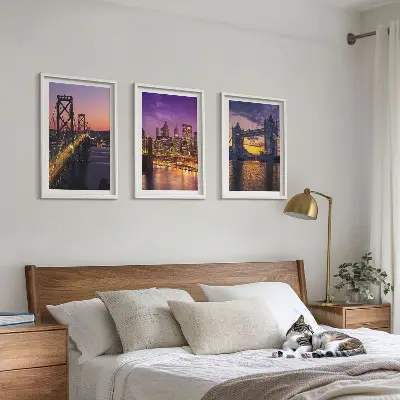Wall art set featuring bridges, sun, and city views