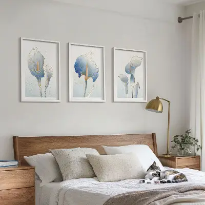 Three-piece wall art set with blue flowers on the background