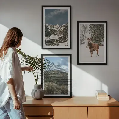 Set of 3 framed wall art pieces featuring a snowy mountain forest and deer landscape
