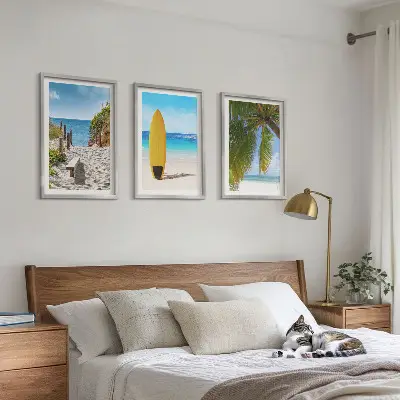Set of 3 framed wall art pieces featuring holiday beaches, ocean waves, and palm trees