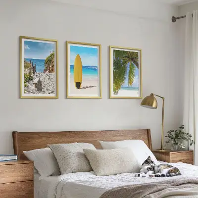 Set of 3 framed wall art pieces featuring holiday beaches, ocean waves, and palm trees