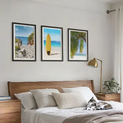 Set of 3 framed wall art pieces featuring holiday beaches, ocean waves, and palm trees