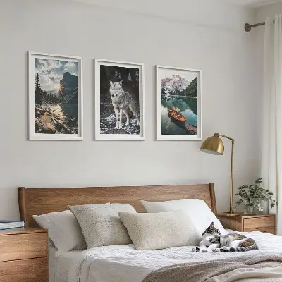 Set of 3 framed wall art pieces featuring mountain lake and wolf scenery