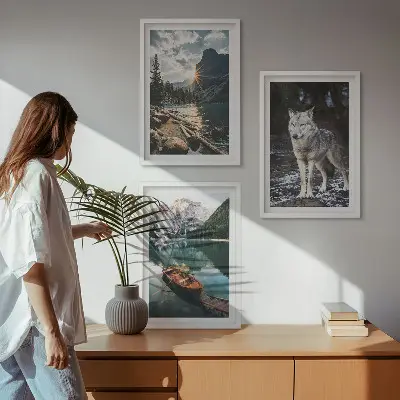 Set of 3 framed wall art pieces featuring mountain lake and wolf scenery