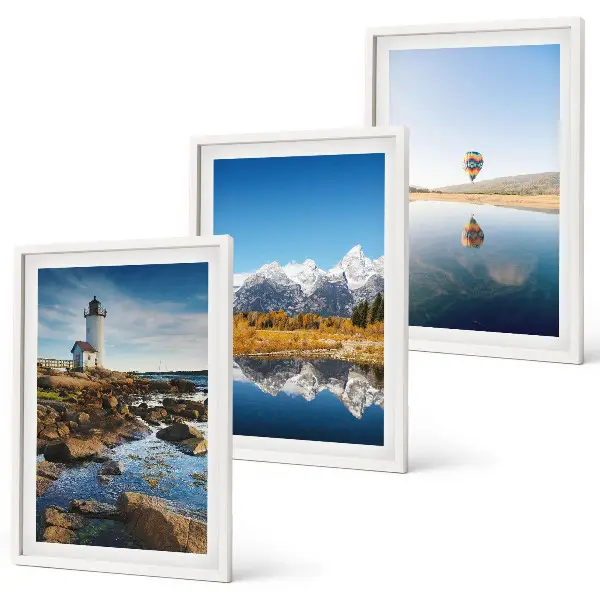 Wall art set featuring views of nature with a lighthouse, mountains, and a balloon
