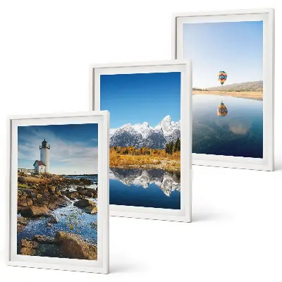 Wall art set featuring views of nature with a lighthouse, mountains, and a balloon