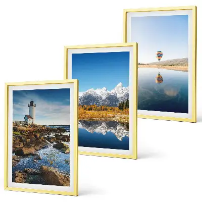 Wall art set featuring views of nature with a lighthouse, mountains, and a balloon