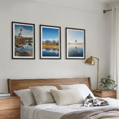 Wall art set featuring views of nature with a lighthouse, mountains, and a balloon